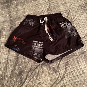 ROMWE shorts, fits S-M. Black, white, orange, red.